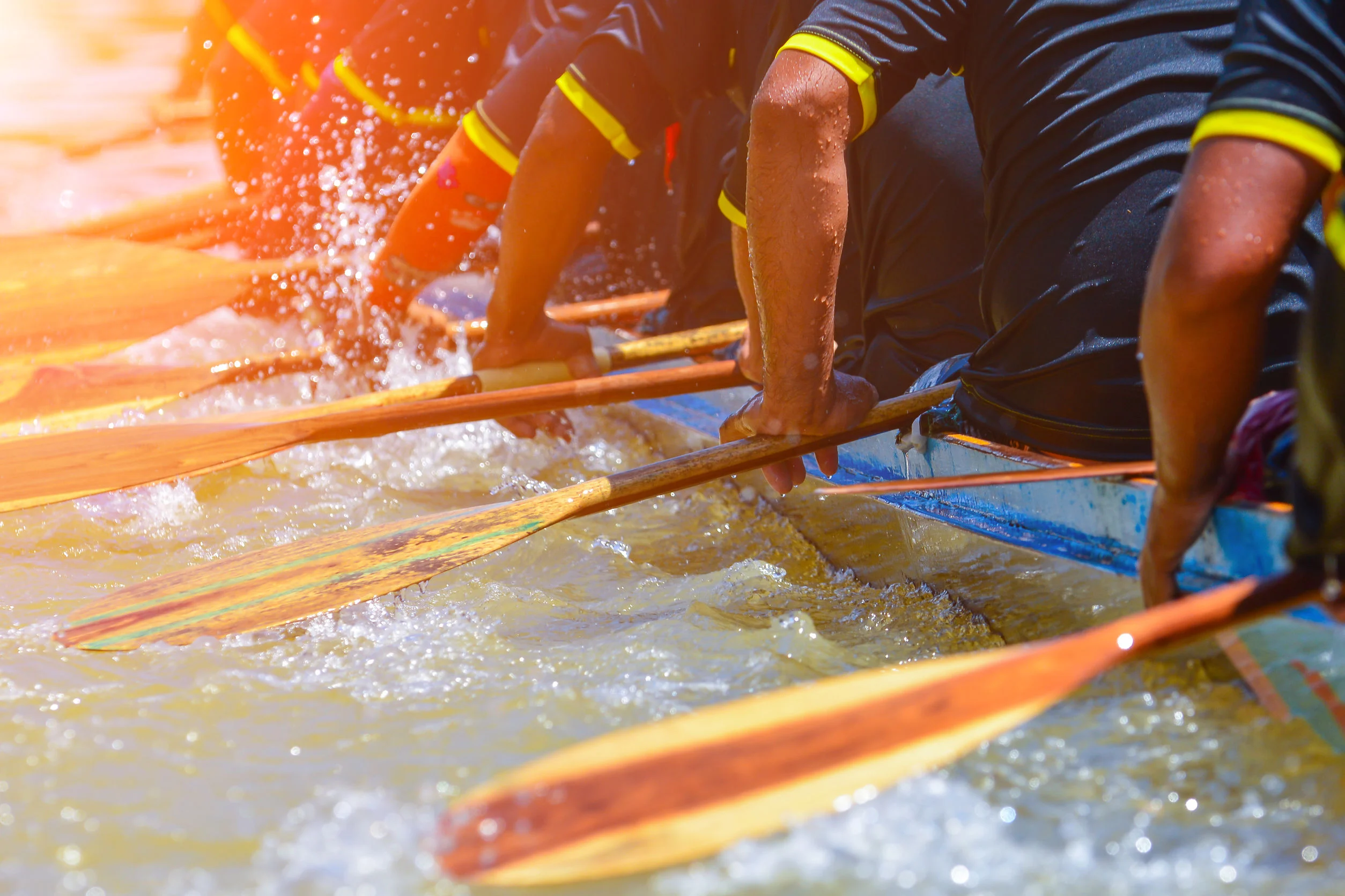 57079452 - rowing team race and color tone effect Kayak in water