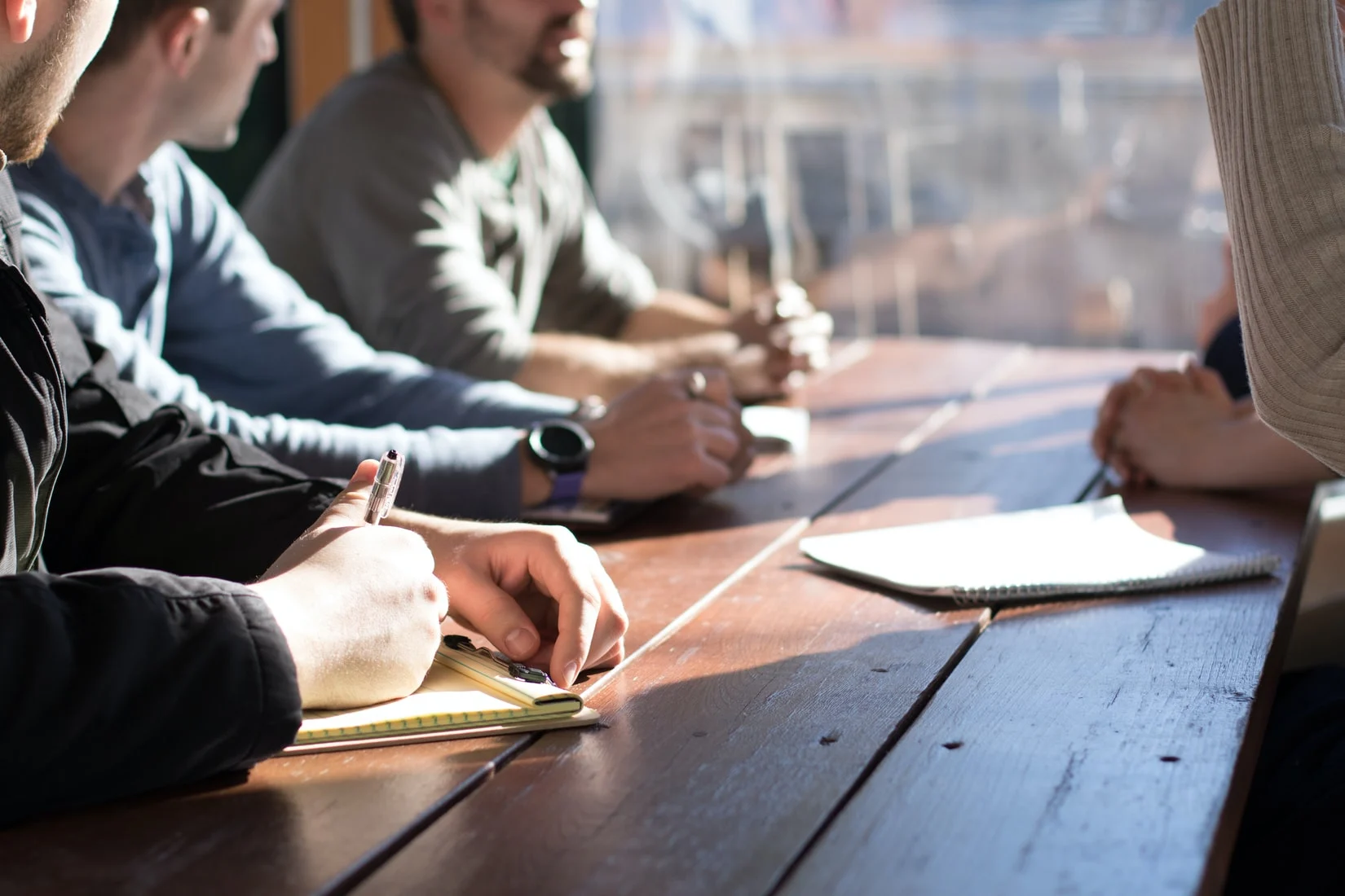 GLL-Blog-Mergers Business team participating in a meeting