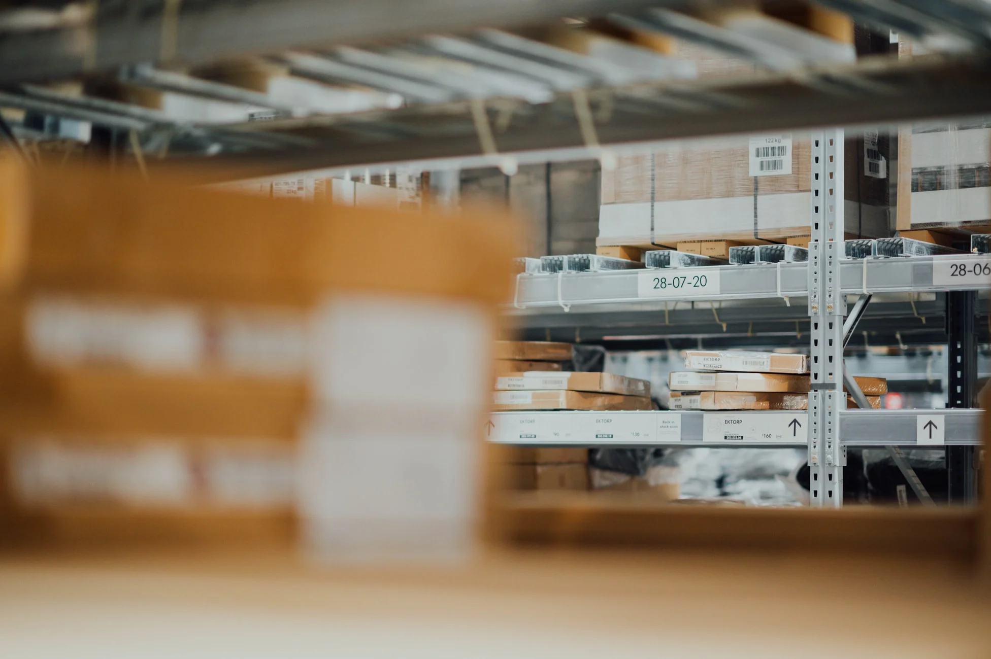 Labeled inventory boxes in warehouse storage