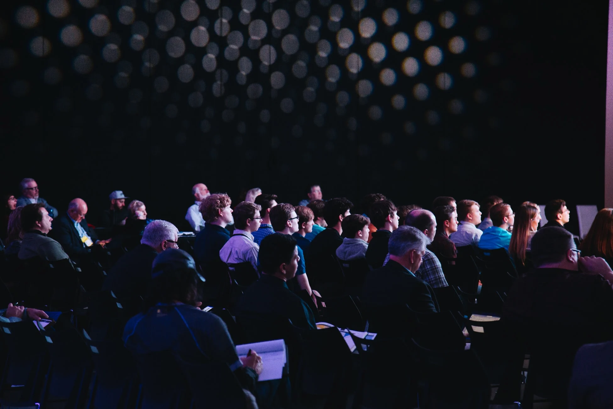incito-lean-consulting-speaking Audience attending a business presentation